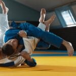Atletas de jiu-jitsu treinando para competição