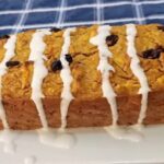 Below view of unrecognizable bodybuilder preparing for deadlift in a gym.